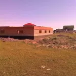 Земельный участок в поселке Каражар и недостроенный дом
