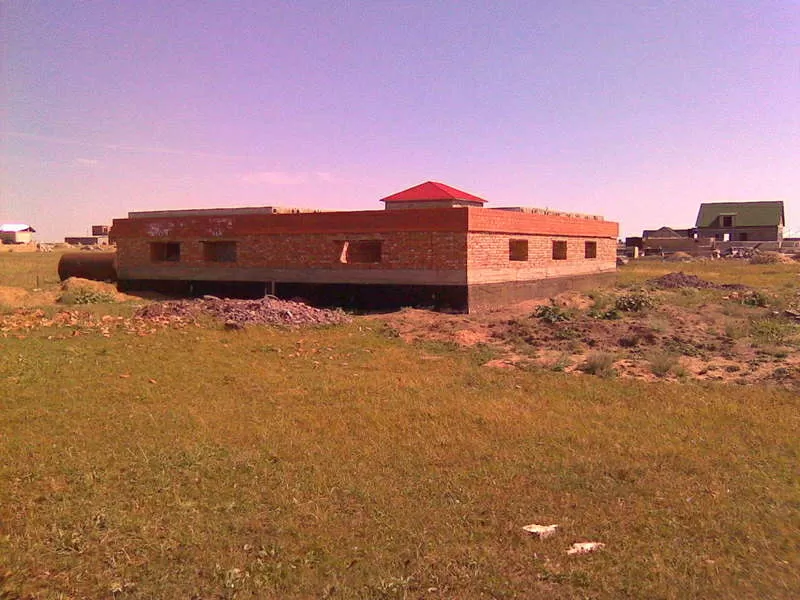 Земельный участок в поселке Каражар и недостроенный дом